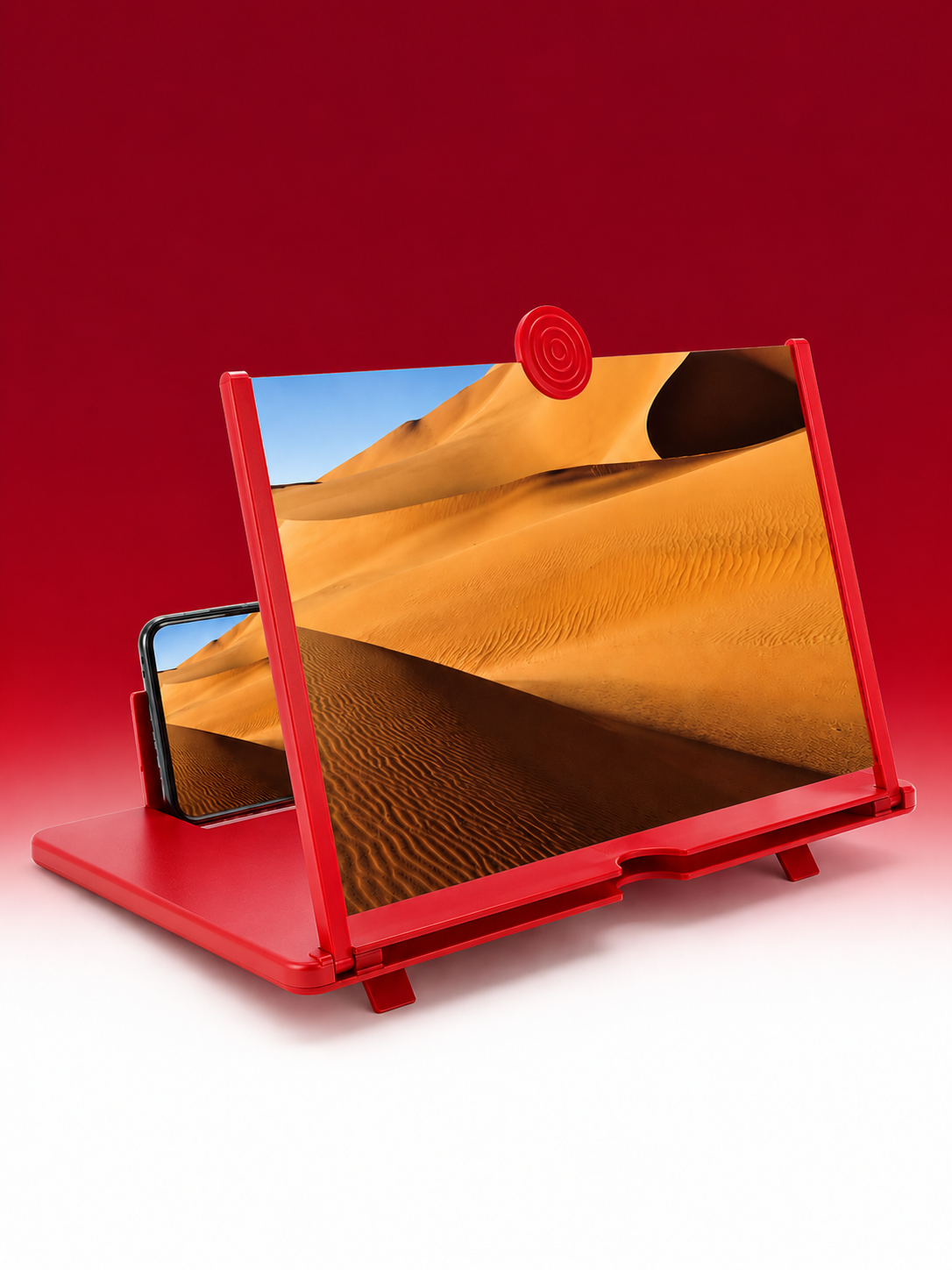 Portable video amplifying screen for smartphones displayed with a vibrant red stand, enhancing mobile viewing experiences.